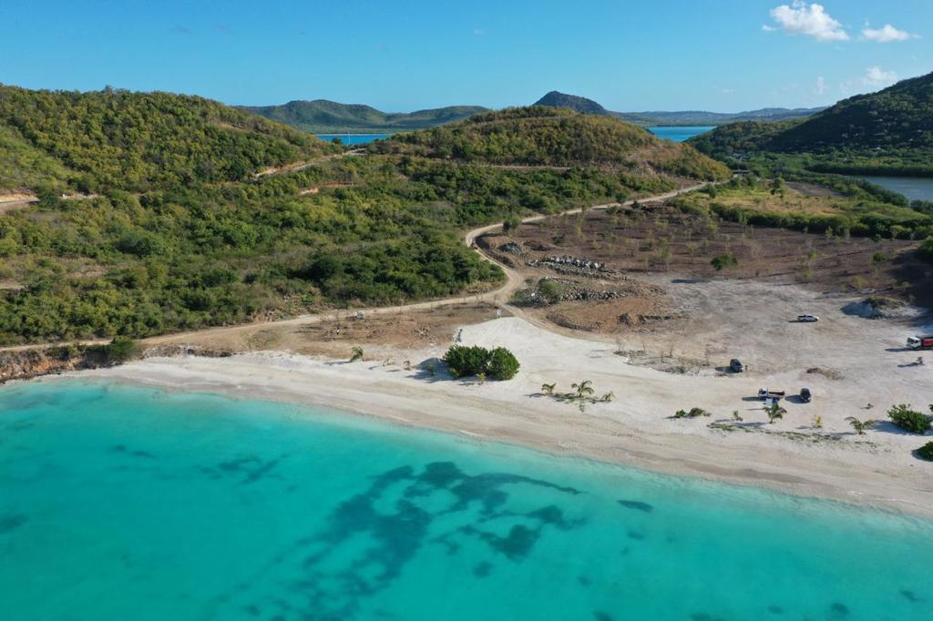 The beach and shoreline at the resort site